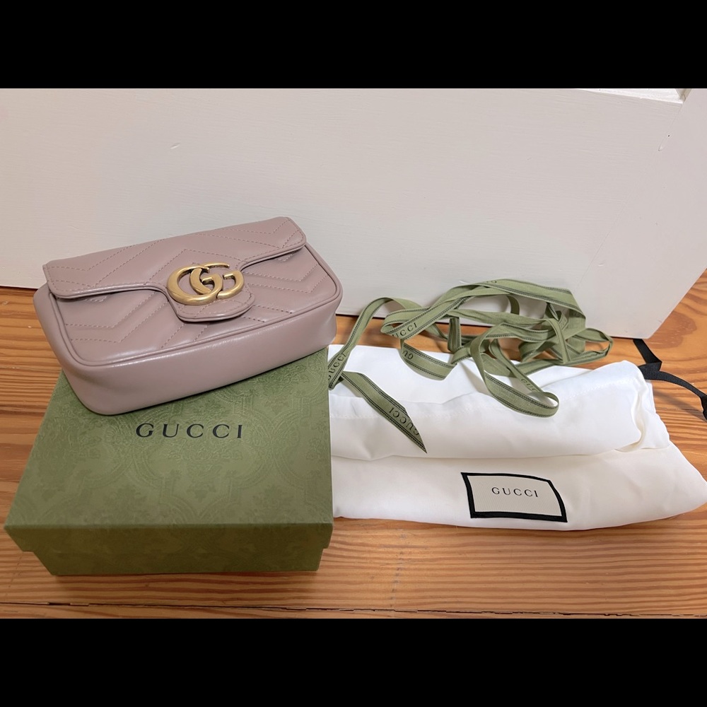 Authentic GG Marmont matelassé leather super mini bag.